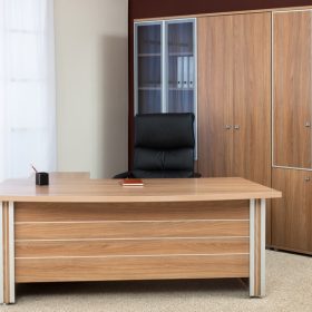 Armchair of manager on a background of a window