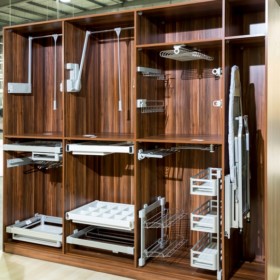 Modern empty wooden wardrobe with shelves